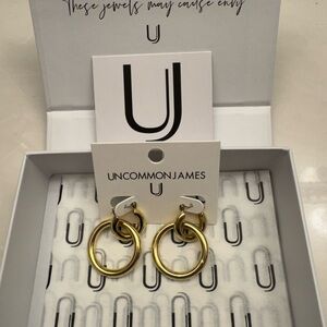 Uncommon James gold double hoop earrings.